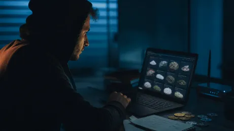 A user deeply engaged in examining drug listings on a dark web marketplace.