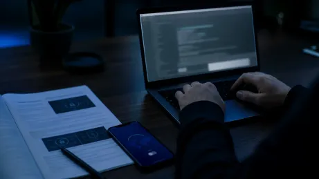 A user focused on verifying the Tor Browser's digital signature on their laptop.